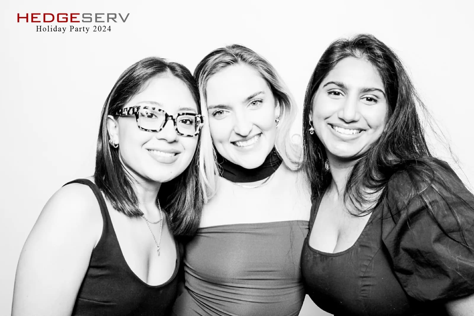Three colleagues in a black and white corporate glam portrait