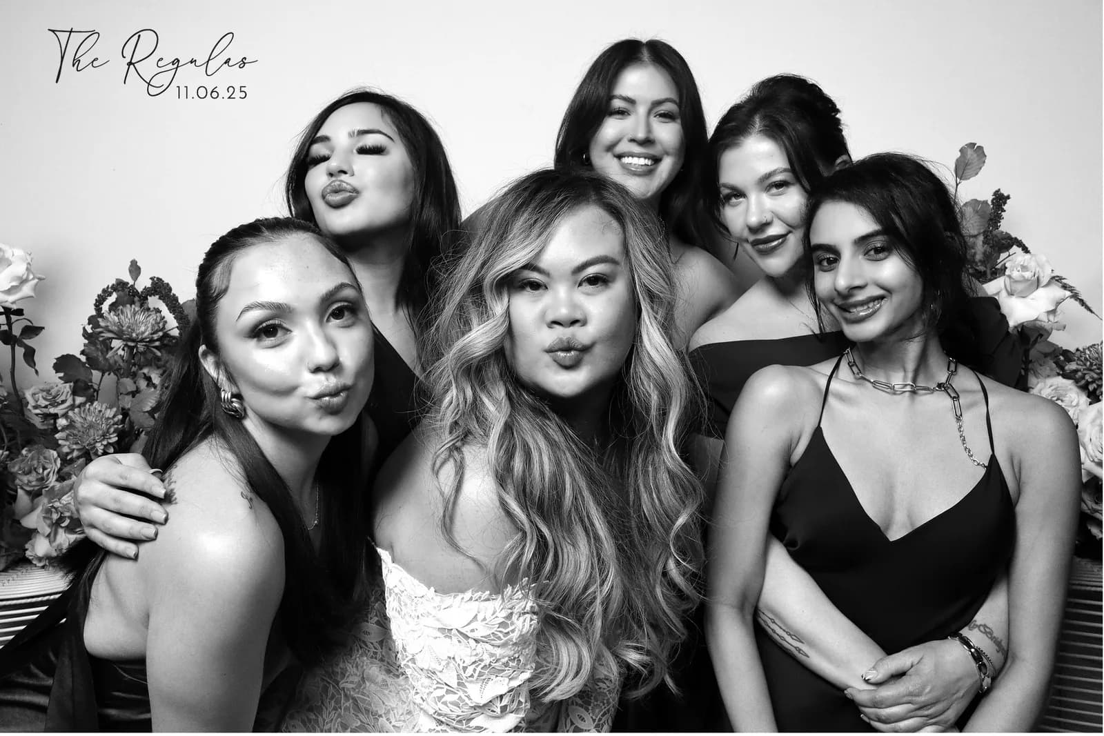 Wedding party group in black and white glam booth