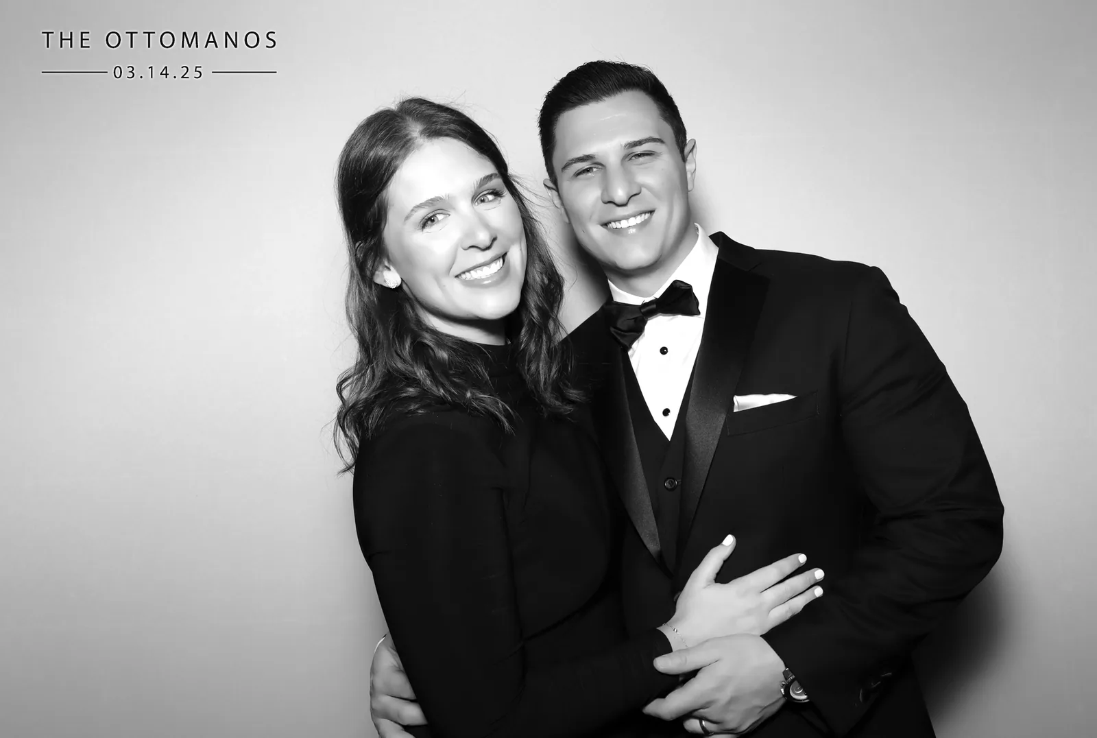 Couple in formalwear, black and white glam photo booth